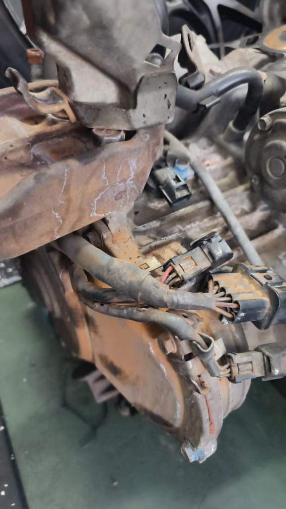 Corroded wiring connectors on an engine harness